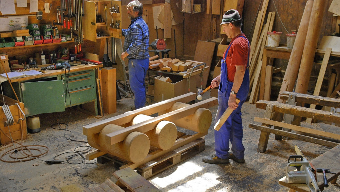 Two men in a carpentry workshop